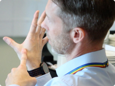 Course participant finger spelling